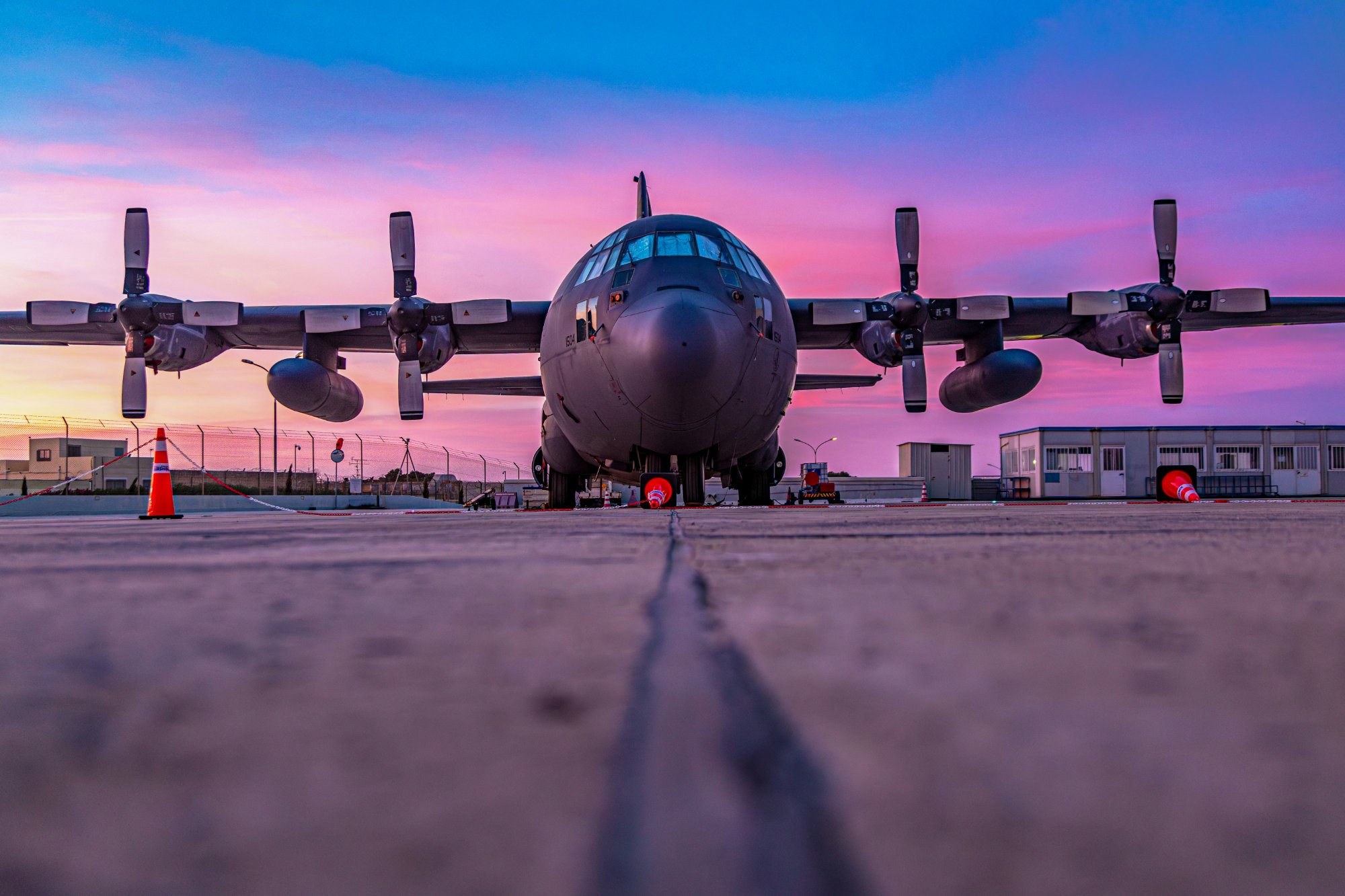 Military transport aircraft at dusk